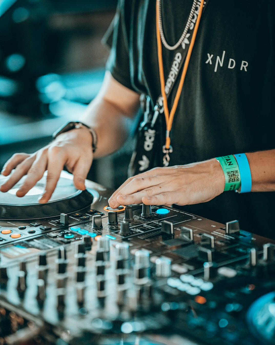 Sound engineer hands on a mixing desk