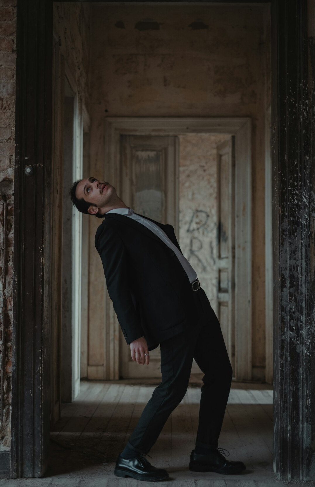 Portrait of a British man in a suit jacket in a studio